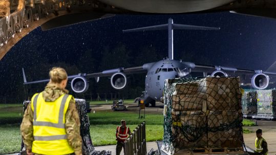 99 Squadron Movers load a Royal Air Force C-17 aircraft with UK aid heading to Egypt for the Palestinians in Gaza 
