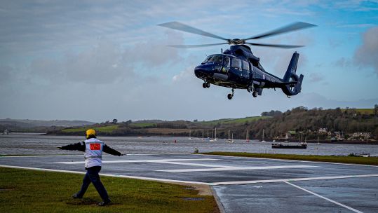 Cover image: A Dauphin helicopter touches down at the new Helicopter Operating Facility at HMNB Devonport (Picture: Royal Navy). 