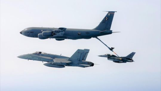 A Finnish FA-18 Hornet with a US KC-135 tanker and an F-16 Fighting Falcon on Astral Knight 23 CREDIT Nato