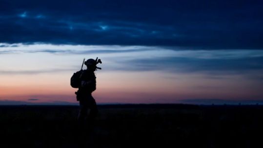 A Royal Anglian soldier sit walks at dusk hetford and Salisbury Plain Training Areas ahead of Mali Deployment 13102020 CREDIT MOD