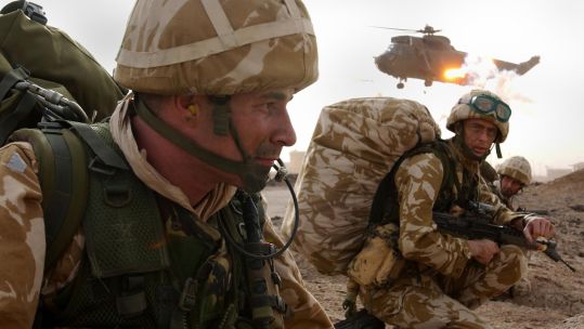 	A Sea King fires flares after dropping 40 Commando ashore at Al Faw