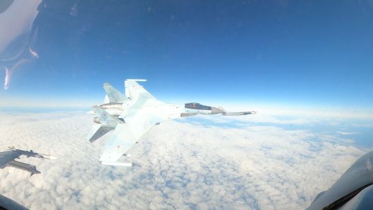 A Russian Su-35 fighter jet performed an unsafe manoeuvre near a US F-16 aircraft during an interception mission over Alaska (Picture: North American Aerospace Defense Command)