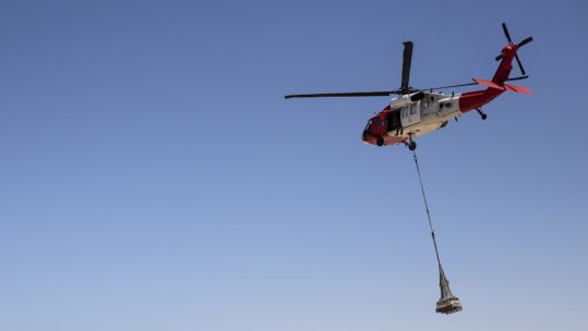 A Task Force Sinai UH-60 Blackhawk Helicopter resupplies a Multinational Force and Observers remote site over the Gulf of Aqaba in the Sinai Peninsula 120919 CREDIT US Department of Defense.jpg 