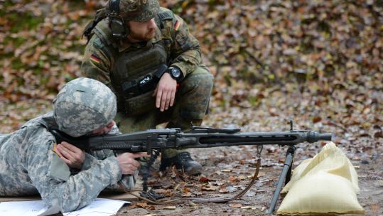 A US soldier fires a Rheinmetall MG3 machine gun during the qualification for the German Armed Forces Badge for Weapons Proficiency on the Panzer Range Complex in Boeblingen, Germany, 19 Nov 2014 credit US Dept Defense.jpg