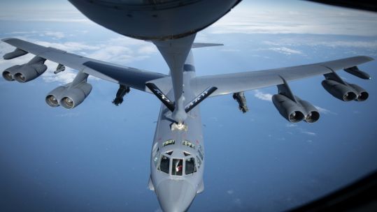 A USAF B-52 bomber refuels over UK coastline (Picture: US Department of Defense).