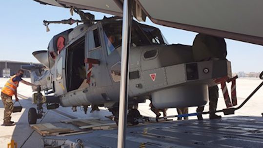 A Wildcat helicopter is transported to the Gulf where it will use new software to assist HMS Montrose and HMS Argyll in operations (Picture: Royal Navy).