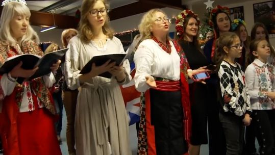 A choir of Ukrainian refugees living in the UK performs Christmas hymns for Ukrainian troops ready to return to the frontline