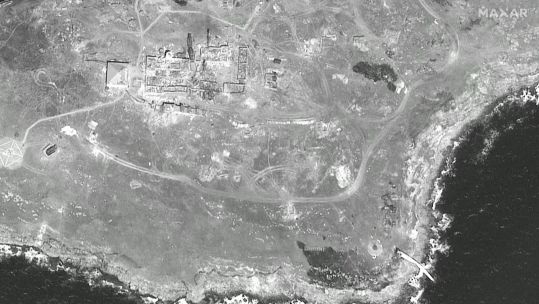 A close up image reportedly showing damage to Russian positions near the Snake Island shoreline (Picture: Maxar Technologies).