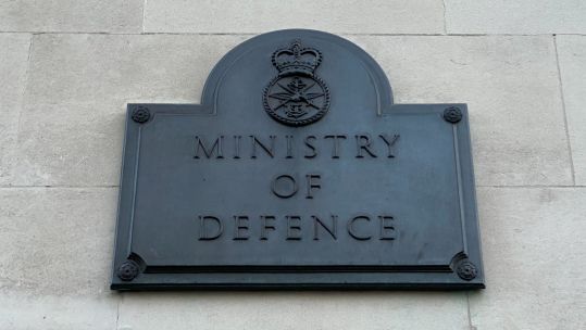 A close up view of the MOD sign at Main Building in London