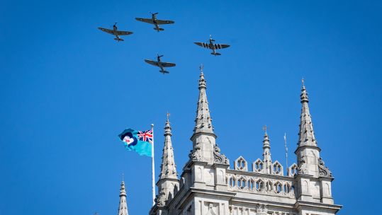 A flypast to mark the 80th anniversary of the Battle of Britain flies over Westminster Abbey (Picture: PA).