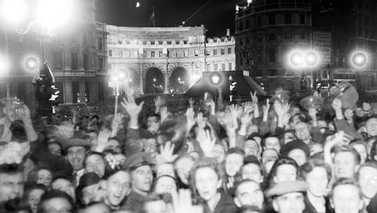 Cover image: People celebrate VE Day in 1945 in Trafalgar Square, London (Picture: EMPICS/PA).