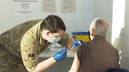 Cover image: Soldier administers a coronavirus vaccine in Stirling.