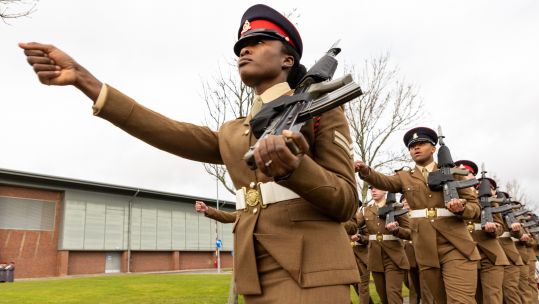 A platoon marches on to the parade square for a graduation parade at AFC Harrogate