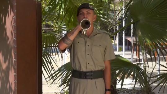A rifleman plays the bugle as part of a competition in Cyprus.
