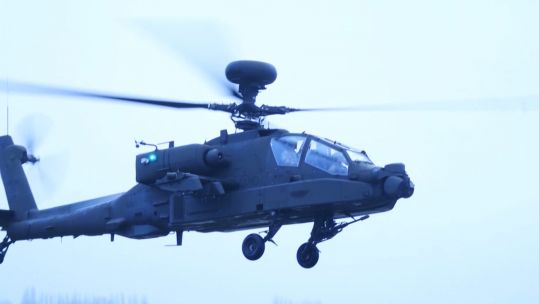 A side view of the Apache AH-64E 