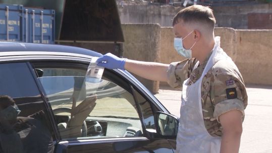 A soldier from 1st Battalion Welsh Guards carries out coronavirus testing.