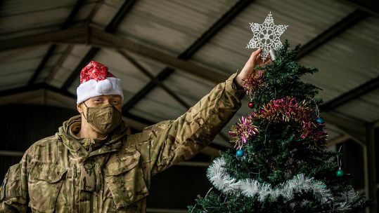 Christmas tree and soldier image (Picture: MOD).