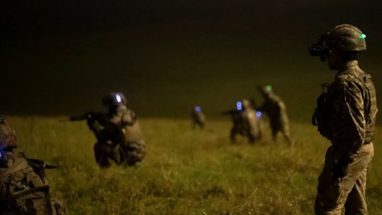 A soldier from The First Battalion Royal Gurkha Rifles provides safety oversight as French paratroopers train on the live fire small arms range on Salisbury Plain for Exercise Wessex (Picture: MOD).