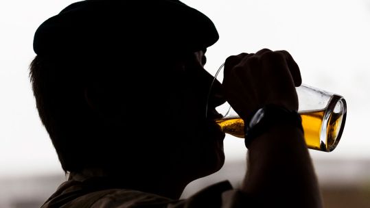 A soldier drinks a pint of beer upon returning from Afghanistan 25 April 2010 Image ID 45152497 CREDIT Crown Copyright 2010