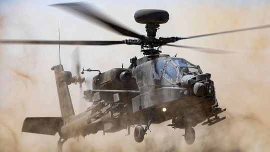 AH-64 Apache conducting a dust landing Ex Pinion Oman