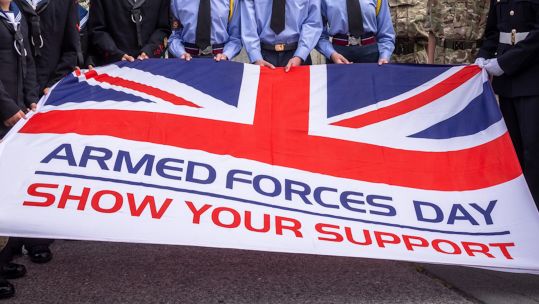 ANON Armed Forces Day flag held by triservice cadets 26062024 CREDIT MOD