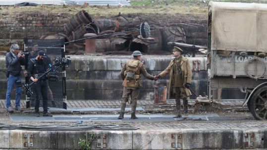 Actors Mark Strong (right) and George Mackay on the set of Sam Mendes' new film 1917 during filming Credit PA Images 120619