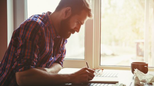 man writing 