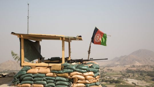 Afghan flag flies over an observation post
