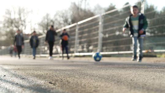 Children playing football