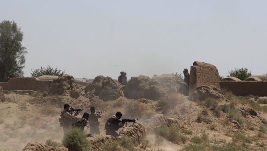 Afghan security force members take part in a military operation against Taliban in Helmand Province, Afghanistan