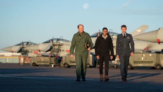 Air Chief Marshal Mike Wigston (left) and Station Commander for RAF Coningsby Billy Cooper (right) with Prime Minister Rishi Sunak during his visit to RAF Coningsby in Linconshire DATE 09122022 CREDIT Alamy .jpg