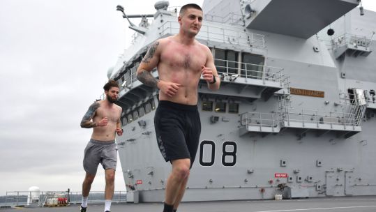 Air Engineering Technicians LAE Calum Dee and AE Giorgio Zsirai run marathon on HMS QE 280520 CREDIT Royal Navy._0.jpg 