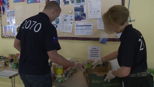 Air cadets Sam and Neave prepare food and household items parcel for vulnerable people during covid19 coronavirus outbreak 230420 CREDIT BFBS.jpg
