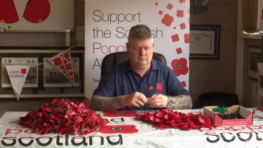 Alastair Skene produces poppies as part of his poppymaking marathon.