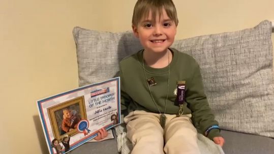 Alfie Neale and his award from military charity Little Troopers