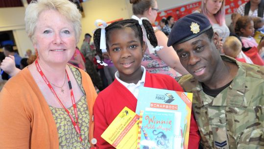 Reading Force Father And Daughter Receive A Book And Scrapbook From Dr Alison Baverstock Credit Aldershot News