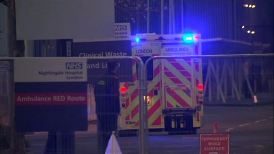 Ambulance enters NHS Nightingale Hospital London with COVID19 patients 080420 CREDIT POOL.jpg