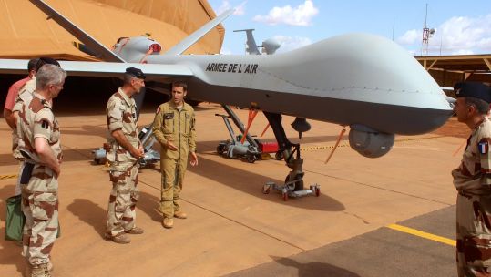American Reaper drones have proved the ideal spotting and attack weapon in this desert war - here for inspection during Op Barkhane.