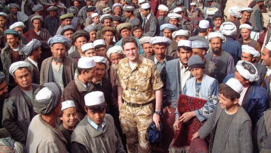 James Wilthew Royal Air Force Veteran Owner Afghan Rug Shop In Andkhoy Weavers Market Afghanistan in 2004 Credit James Wilthew