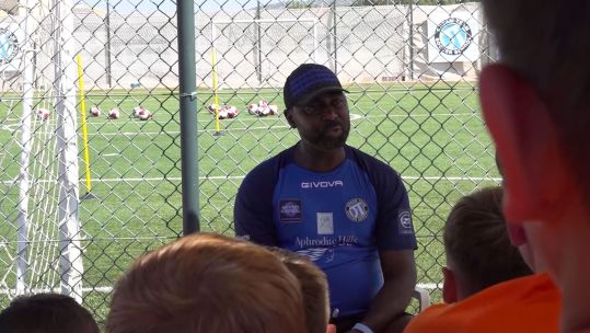 Andy Cole former Manchester United striker Dream Team Soccer School football coaching CREDIT BFBS