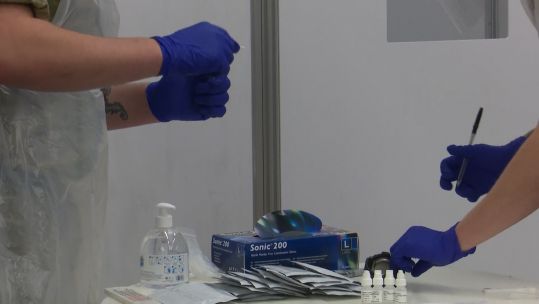 Anon military personnel helping with coronavirus testing in Liverpool during pilot scheme 