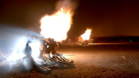 Anonymous British troops launching mortar rounds