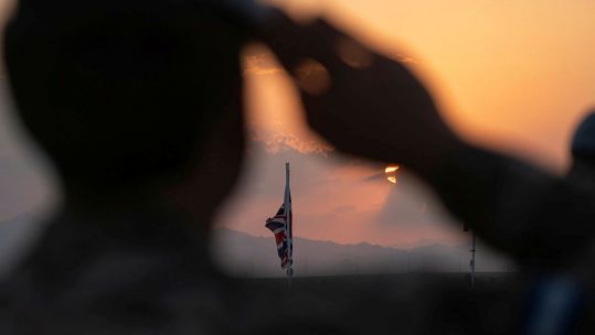 Anonymous Soldiers from 1 Aviation Brigade taking part in a Remembrance parade at the end of their desert training exercise in Oman 