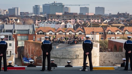 Cover Image: Royal Navy personnel on board aircraft carrier HMS Queen Elizabeth (Picture: Royal Navy).