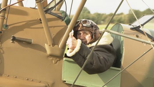 Anthony Hughes in a Tiger Moth biplane 101019 CREDIT BFBS