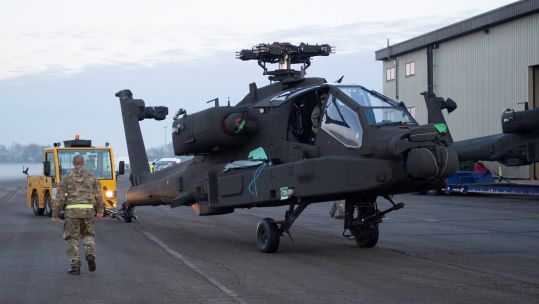 Cover image: One of the Apaches is unloaded from an aircraft at Wattisham Flying Station in Suffolk (Picture: British Army).