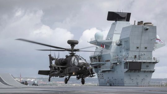 The Apache landing on HMS Queen Elizabeth (Picture: Royal Navy).