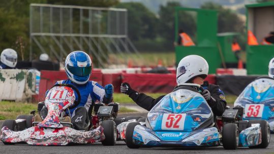 Armed Forces Karting Championships fist bump Credit SSgt Kyle Clarke JMS Photography DATE 29072023.jpg