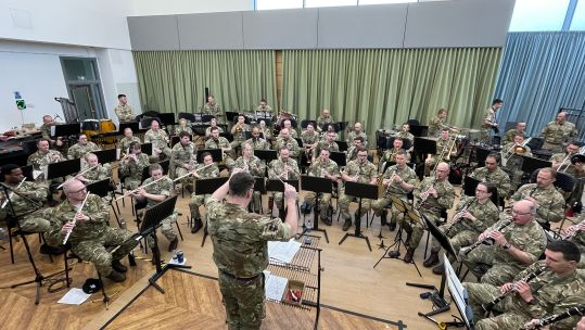 Army Corps of Music rehearse before their performance