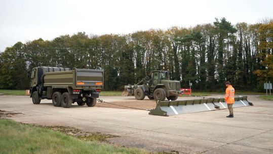 Army Engineers and RAF personnel fixing craters at RAF Marham 041124 CREDIT BFBS.j